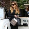 Khloé Kardashian quitte l'institut de beauté Epione à Beverly Hills. Los Angeles, le 19 décembre 2014.