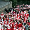 Plus de 250 personnes ont participé, vêtues en Père Noël, à la première Grande Parade des Pères Noël de la Côte d'Azur, avec comme marraine la chanteuse et comédienne Lio, à Vallauris Golfe-Juan, le 20 décembre 2014.
