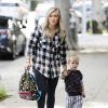 Hilary Duff est allée chercher son fils Luca à son atelier d'éveil à West Hollywood, le 24 décembre 2014. Hilary Duff et son fils ont ensuite retrouvé Mike Comrie, son mari dont elle est séparée. 