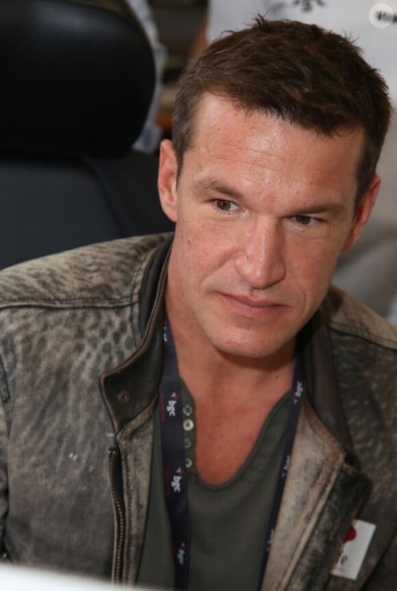 Charity Day BGC 2014 - Benjamin Castaldi - Courtier d'un jour pour encourager les clients à passer ce jour-là le maximum d'ordres dans la salle des marchés d'Aurel BGC Rue Vivienne à Paris. Le 11 septembre 2014.