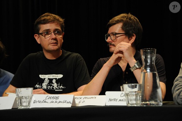Les dessinateurs Charb et Luz au Théâtre du Rond-Point le 4 novembre 2011. Le premier est mort dans l'attentat contre "Charlie Hebdo" ce 7 janvier 2015.