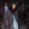 La chanteuse Rihanna emmitouflée dans un long manteau noir dans la rue à New York, le 9 janvier 2015