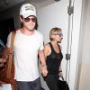 Chris Hemsworth et Elsa Pataky arrivent à l'aéroport de LAX à Los Angeles, le 26 aout 2014  