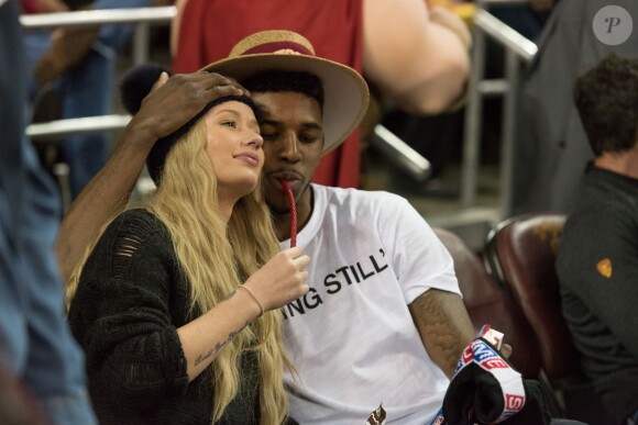 Iggy Azalea et Nick Young assistent à la rencontre de basket USC - UCLA au Galen Center. Los Angeles, le 14 janvier 2015.
