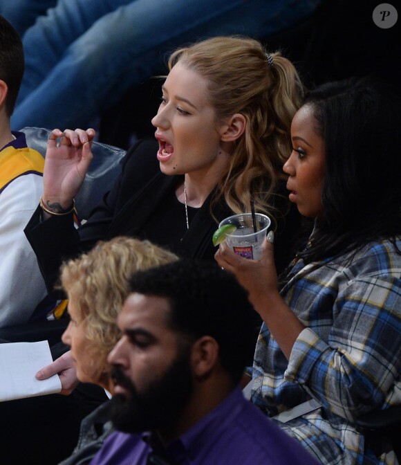 Iggy Azalea assiste à la rencontre Los Angeles Lakers - Phoenix Suns au Staples Center. Los Angeles, le 28 décembre 2014.