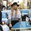 Iggy Azalea prend de l'essence puis va faire du shopping à Westwood, le 16 janvier 2015. 