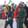 Kim Kardashian et Kanye West lors de leur arrivée au Phoenix Stadium de Glendale le 1er février 2015
