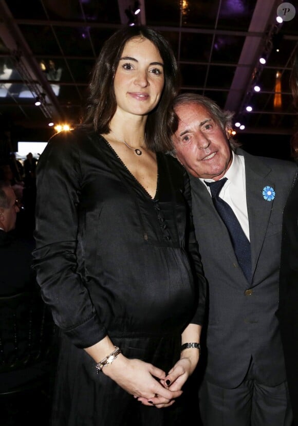 Margot Laffite (enceinte de 8 mois de son compagnon Arnaud Tsamère) et son père Jacques, à Paris, le 27 janvier 2015.