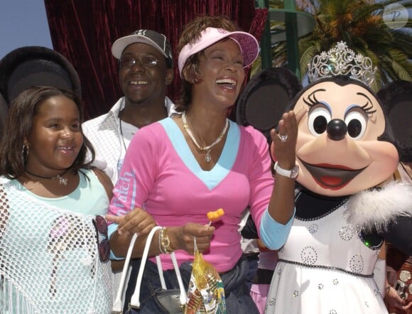 Whitney Houston, Bobby Brown et Bobbi Kristina à Disneyland à Anaheim, le 7 août 2004
