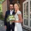 Mariage civil de l'animatrice Sandrine Corman et Michel Bouhoulle, à la mairie de Lasne, en Belgique, le 12 septembre 2014.