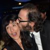 Romane Bohringer et son compagnon Philippe Rebbot - Cocktail lors de la présentation de la nouvelle étoile de la galaxie "Angel" de Thierry Mugler avec sa nouvelle égérie Georgia May Jagger à la Coupole du Printemps Haussmann à Paris, le 30 janvier 2015