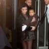 Kim Kardashian et sa fille North West se rendent au Skylight Clarkson Square pour assister au défilé YEEZY SEASON 1 (adidas Originals x Kanye West). New York, le 12 février 2015.
