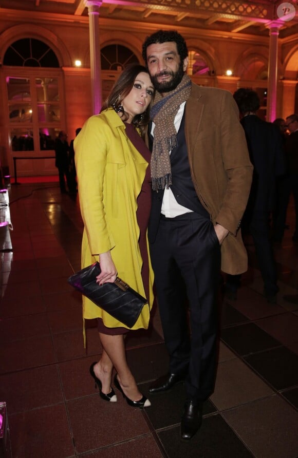 Ramzy Bédia et sa girlfriend Marion pendant la soirée des Trophées du Film Francais au Palais Brongniart, Paris, le 12 février 2015.