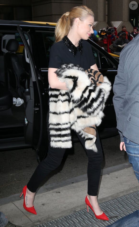 Iggy Azalea arrive aux "Billboard Women in Music Luncheon" à New York. Le 12 décembre 2014  