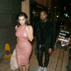 Kim Kardashian et Kanye West quittent le salon de tatouage Sang Bleu à Londres, le 26 février 2015.