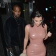 Kim Kardashian et Kanye West quittent le salon de tatouage Sang Bleu à Londres, le 26 février 2015.