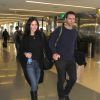 Courteney Cox et Johnny McDaid ainsi que Coco sont photographiés à LAX l'aéroport de Los Angeles le 25 février 2015