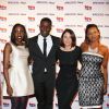 Tonjé Bakang, fondateur d'Afrostream, accompagné de l'équipe organisatrice de la soirée (Gisèle Tchayem, Gaëlle Bouvier et Pamela Diop) lors du lancement du label AfrostreamVOD chez TF1 à Boulogne-Billancourt, le 4 mars 2015.