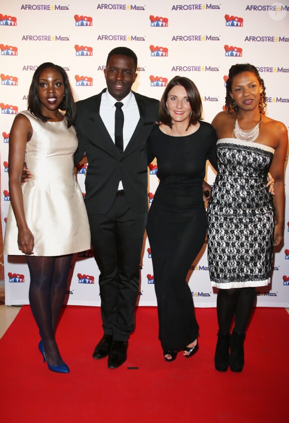 Tonjé Bakang, fondateur d'Afrostream, accompagné de l'équipe organisatrice de la soirée (Gisèle Tchayem, Gaëlle Bouvier et Pamela Diop) lors du lancement du label AfrostreamVOD chez TF1 à Boulogne-Billancourt, le 4 mars 2015.
