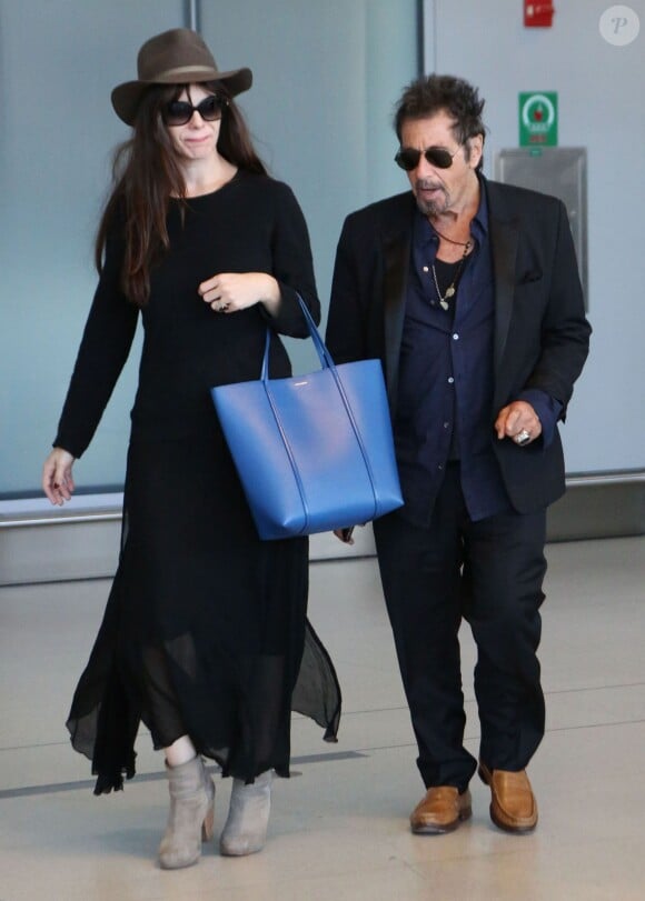 Al Pacino et sa compagne Lucila Sola arrivant à l'aéroport de Toronto pour prendre un avion. Le 7 septembre 2014