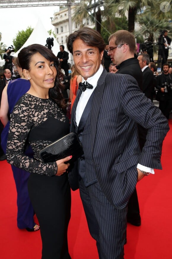 Giuseppe Polimeno et sa compagne Hinda arrivent au Palais des Festivals pour le film Jimmy's Hall lors du 67e Festival de Cannes, le 22 mai 2014