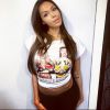 Nabilla dévoile son ventre avec un top court, et sa mine radieuse, le 17 mars 2015