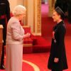 Dame Kristin Scott Thomas is made a Dame Commander of the British Empire by Queen Elizabeth II during an Investiture ceremony at Buckingham Palace in London, UK on March 19, 2015. Photo by Jonathan Brady/PA Wire/ABACAPRESS.COM19/03/2015 - London