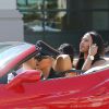 Amber Rose sur les routes de Beverly Hills dans sa Ferrari avec des amis, Los Angeles, le 2 avril 2015