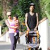 Amber Rose et son mari Wiz Khalifa promenent leur fils Sebastian a Los Angeles le 28 janvier 2014. 