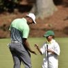 Tiger Woods et sa fille Charlie à l'occasion du "Par 3 Contest" au National Golf Club d'Augusta, le 8 avril 2015