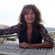 Exclusif - Clémentine Célarié pose à l'hôtel Aston à Nice, le 1er août 2014.