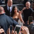 Kim Kardashian arrive au Marionnaud des Champs-Élysées pour le lancement des produits capillaires de Kardashian Beauty. Paris, le 15 avril 2015.