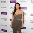 Kim Kardashian célèbre le lancement des produits capillaires de Kardashian Beauty chez Marionnaud, sur les Champs-Élysées. Paris, le 15 avril 2015.