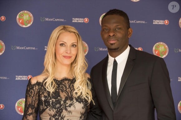 Louis Saha et Aurélie Saha au gala de la fondation Didier Drogba à Londres le 18 avril 2015.
