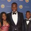 Didier Drogba, Iman Drogba, et Issac Drogba au gala de la fondation Didier Drogba à Londres le 18 avril 2015.