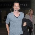  Matthew Bellamy, fra&icirc;chement c&eacute;libataire, arrive &agrave; l'a&eacute;roport de Los Angeles, le 15 d&eacute;cembre 2014.&nbsp;  