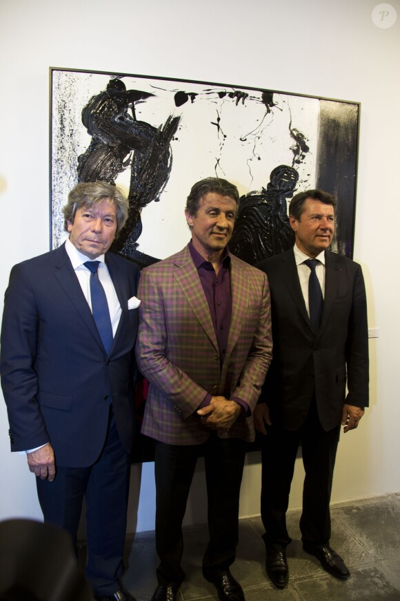 Christian Estrosi aux cotés de Sylvester Stallone qui présente ses peintures lors de l'expo Real Love Paintings 1975-2015, à la Galerie Contemporaine du Musée de Nice, le 16 mai 2015.