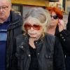 Brigitte Bardot accompagnée par les proches lors des obsèques de Gérard Montel, son coiffeur, ami et confident en l'église de l'Assomption à Saint-Tropez, le 19 mars 2015.