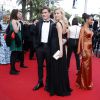 Pixie Lott et son compagnon Oliver Cheshire - Montée des marches du film "Dheepan" lors du 68e Festival International du Film de Cannes le 21 mai 2015