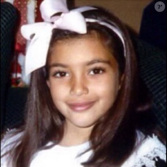 Kim Kardashian, à 7 ans. Photo publiée le 18 décembre 2014.
