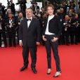 Périco Légasse et sa femme Natacha Polony - Montée des marches du film "Macbeth" lors du 68e Festival International du Film de Cannes, le 23 mai 2015.