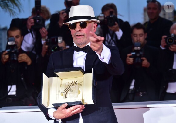 Jacques Audiard (Palme d'Or pour le film "Dheepan") - Photocall de la remise des palmes du 68e Festival du film de Cannes, à Cannes le 24 mai 2014.