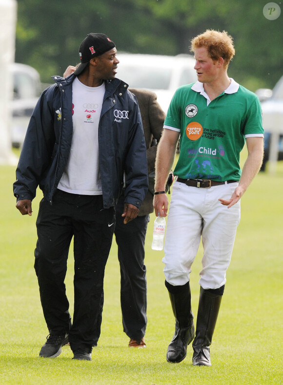 Le prince Harry au club de polo de Cirencester Park dans le Gloucestershire le 24 mai 2015 pour le Jerudong Trophy.