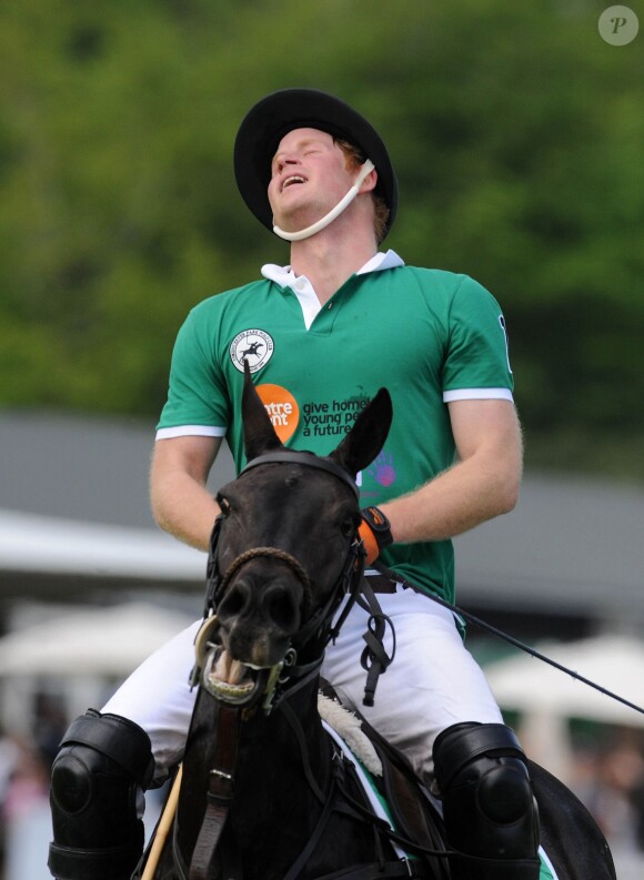 Le prince Harry au club de polo de Cirencester Park dans le Gloucestershire le 24 mai 2015 pour le Jerudong Trophy.