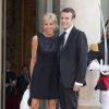 Emmanuel Macron et sa femme Brigitte Trogneux arrivant à l'Elysée le 2 juin 2015 pour le dîner officiel organisé en l'honneur de la visite d'Etat du roi Felipe VI et de la reine Letizia d'Espagne.