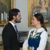 Le prince Carl Philip de Suède et sa fiancée Sofia Hellqvist lors de la réception au palais à Stockholm le 6 juin 2015 pour la Fête nationale.