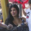 Kim Kardashian enceinte et son mari Kanye West emmènent leur fille North à Disneyland pour son anniversaire (2 ans) en compagnie de Kourtney Kardashian et ses enfants Mason et Penelope à Anaheim, le 15 juin 2015.