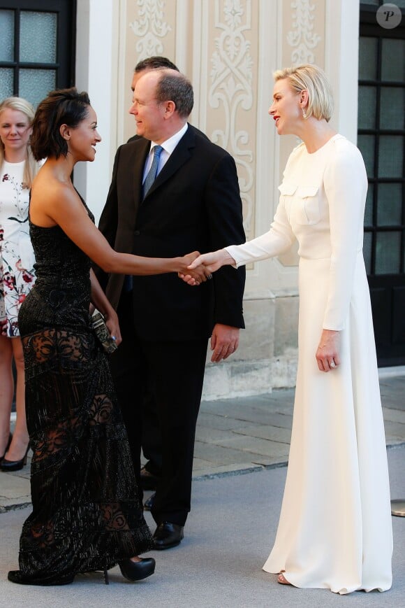 Kat Graham (Katerina Graham) salue la princesse Charlène de Monaco - Cocktail au Palais Princier lors du 55ème Festival de Télévision de Monte-Carlo, le 17 juin 2015.  