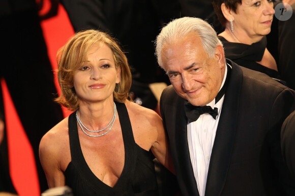 Dominique Strauss-Kahn et sa compagne Myriam L'Aouffir sur le tapis rouge lors du 66e Festival du film de Cannes, le 25 mai 2013.