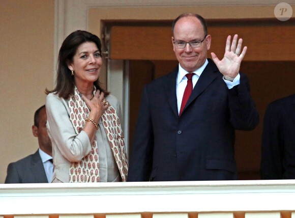 Le Prince Albert II de Monaco, sa soeur la princesse Caroline de Hanovre et son fils Andréa Casiraghi, ont assisté à la traditionnelle procession et à l'embrasement du feu de la Saint Jean sur la Place du Palais le 23 juin 2015.